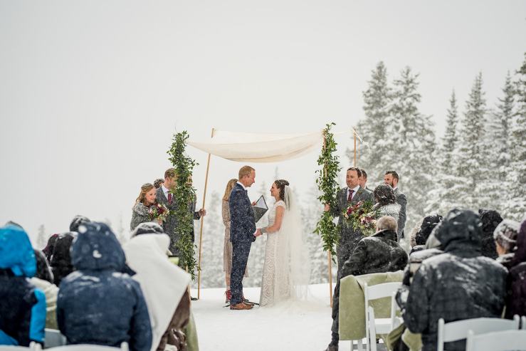 Snowy mountaintop wedding ceremony.